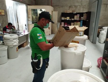 Technician Making Glue Board traps